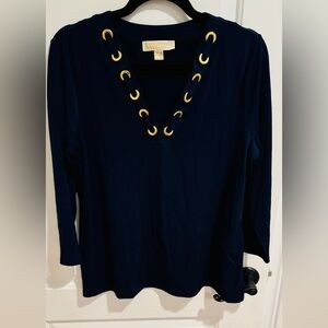 Dark navy blue top with a V neck